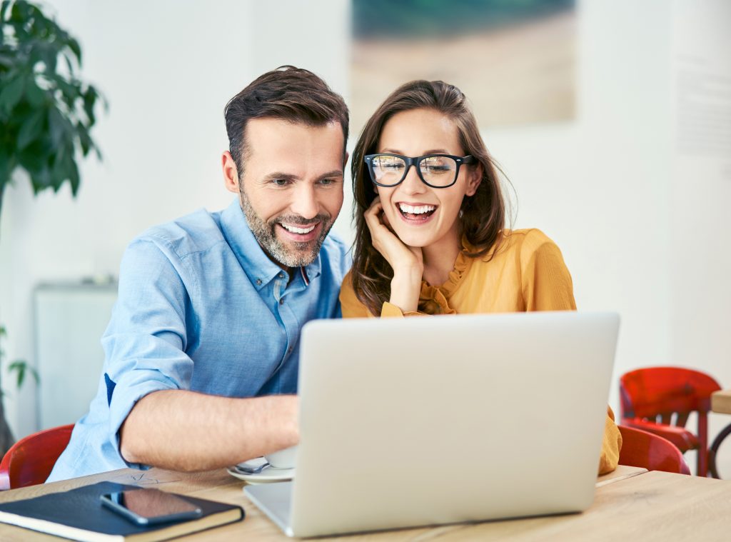 Man and woman on computer