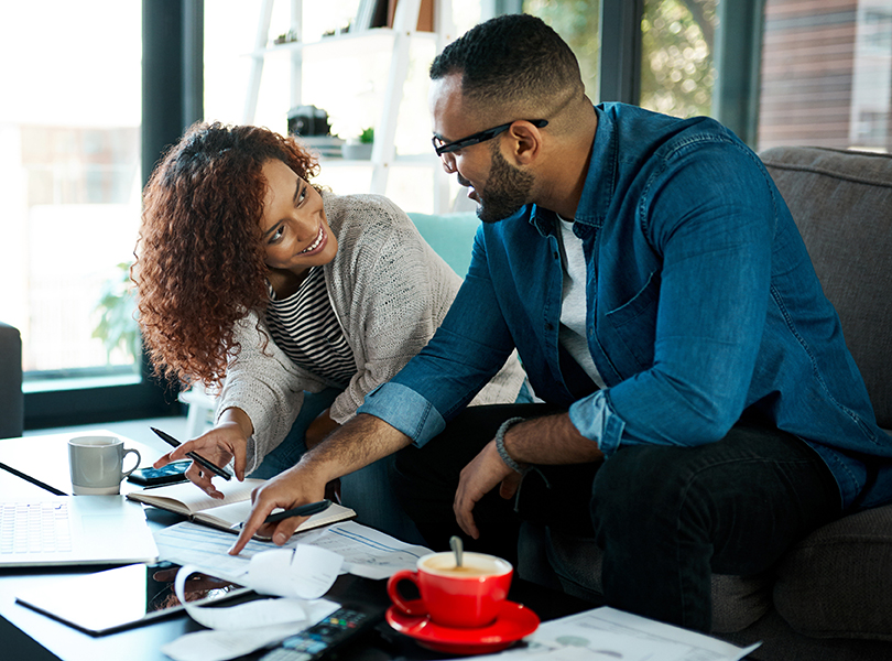 Young couple looking at documents